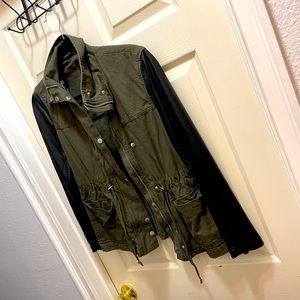 Olive green jacket with leather sleeve
